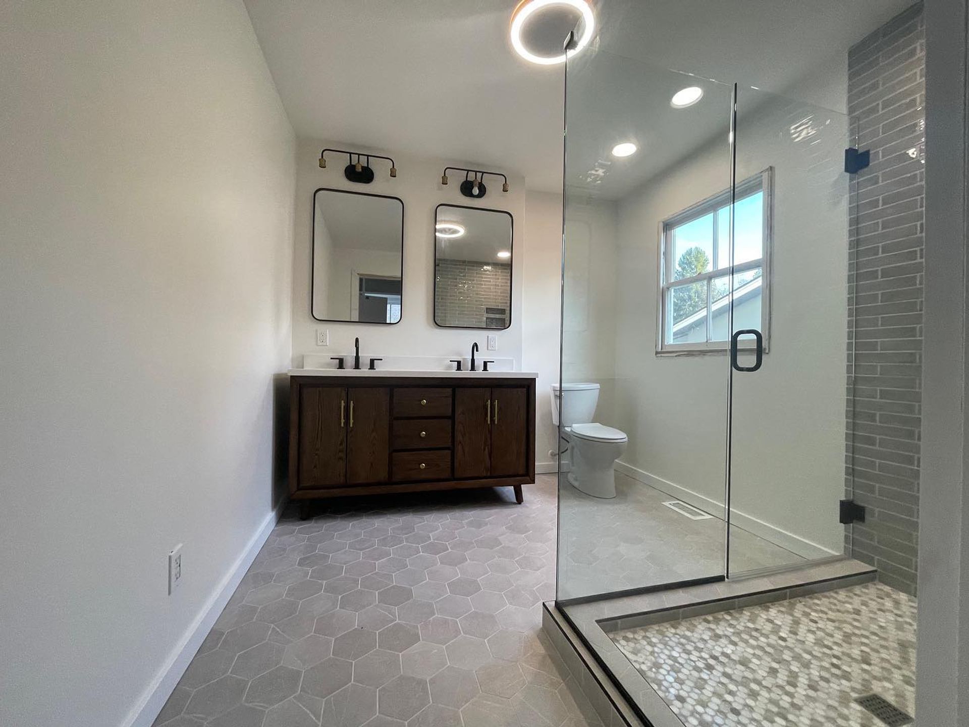 bathroom tile, vanity, and shower